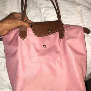 small pink longchamp bag